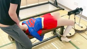 Supergirl is hogtied, her pussy hardly fucked by a machine, a huge cock is stuffed into her mouth and received a big load cum