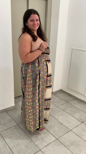 Flashing in the hallway, tits out of the dress.