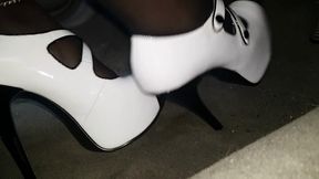 Black and white heel peddle pushing