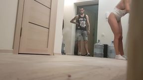 Woman flashes her tits in front of the water delivery boy