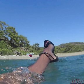 highheel and pantyhose on the beach