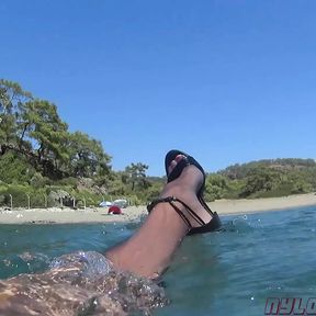 highheel and pantyhose on the beach