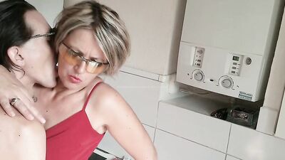 Blonde cougar is being fingered in the kitchen by a kinky stepson