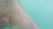 Bare skin sparks raw passion at public beach