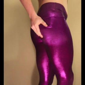 Ass spank in shiny leggings