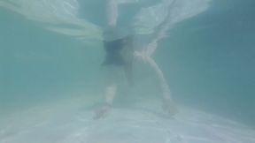 Submerged Underwater in White Blouse