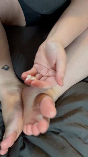 Putting lotion on my feet