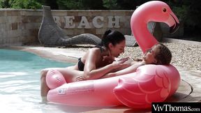 Gorgeous lesbian has fun in the pool making her lover cum