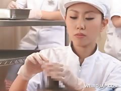 Teen asian nurses rubbing shafts for sperm medical exam