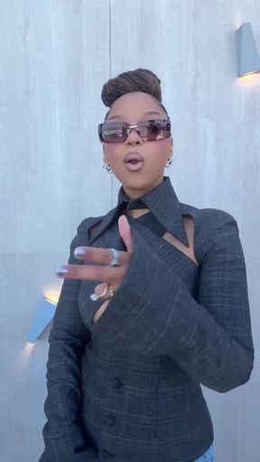Celeb with natural ebony black tits exposes her cleavage