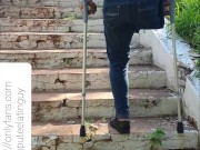 Amputee guy climbing stairs