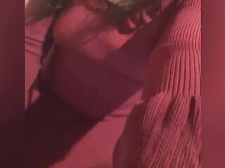 Guy with breasts wearing red dreas and hose
