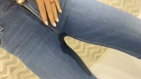 Peeing in skinny jeans, getting wet and undressing