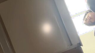 Giantess stomping on small man at work