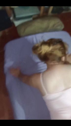 Homemade POV on the Mattress: My Girlfriend in a Pink Shirt and Cell Phone in Her Hand