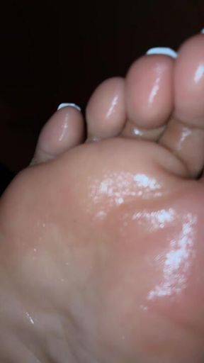 My oiled up soles and white toes