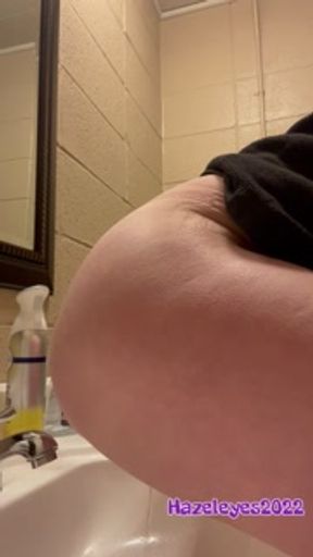 Caught girl peeing in the sink at work in staff bathroom during potty break