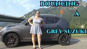 BOUNCING A GREY SUZUKI