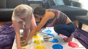 Two hot lesbians are playing a strip twister game