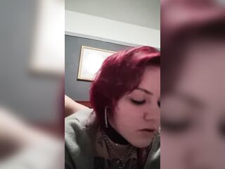 Thong wrapped around neck and drilled coarse