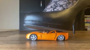 Orange toy car crush