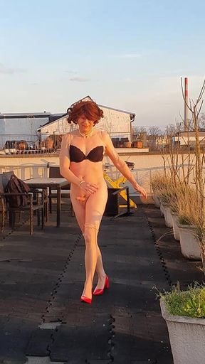Sissy naked on the roof terrace