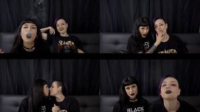 Goth girls sharing smoke