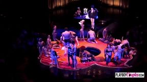 Couples enjoy acrobatic sexual show.