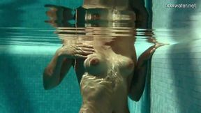 Young swimmer shows off her toned body