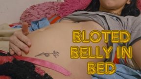 Inflation and bloated belly laying down in bed