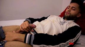camilo jerking off inside a condom, filling it with cum, and then eating his cum from it.