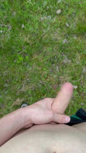 Nudism taken in hand outside in nature penis