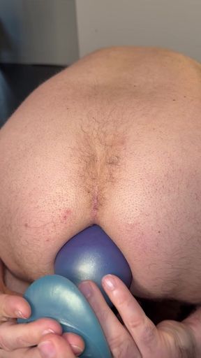 Chastity locked big plug insertion - anal stretching