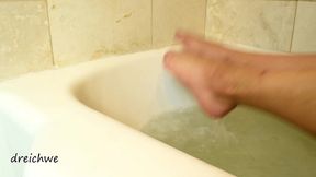 feet in hot water in a jacuzzi