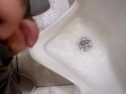 Pissing at a grocery store mens room