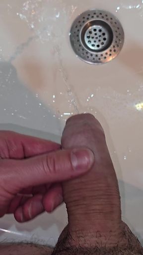 Pissing to the Bathroom Sink