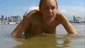 Polish blonde college chick with huge tits gets naked on the beach