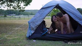 Asian chick is fucking with her boyfriend in a tent outdoors