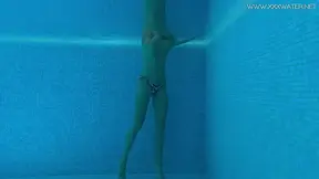Very fit Russian babe Mary Kalisy shows off her hot body in a nude swim