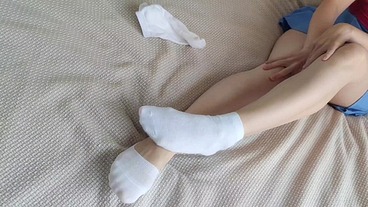 White mismatched socks for a sensual Sockjob