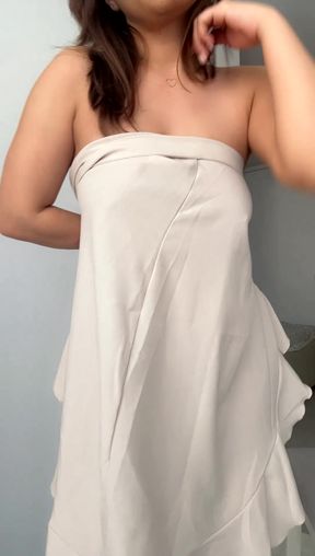 Sexy white woman in a white dress