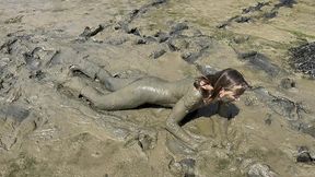 estuary mud girl playing in the nude (wam, wet and messy)