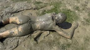 estuary mud girl playing in the nude (wam, wet and messy)