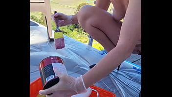 Naked housewife paints walls in public