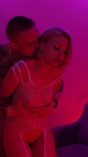 A Striptease in Fishnet Clothing with Passionate Sex as a Gift