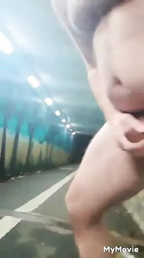 Public strip, jerk and cum in tunnel