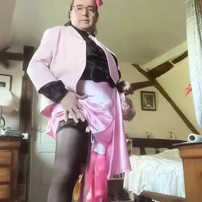 In sexy outfit with a pink skirt