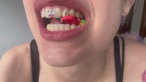 Giant crushes, bites and plays with tiny person