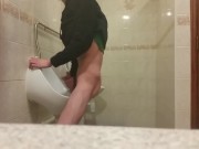 Very skinny teen masturbates in public bathroom urinal