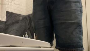 amateur boy in jeans shorts with big hanging balls caught pissing hands free